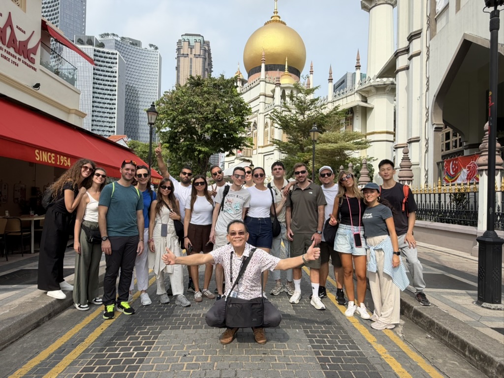 Walking tour group outside Sultan Mosque in Kampong Gelam